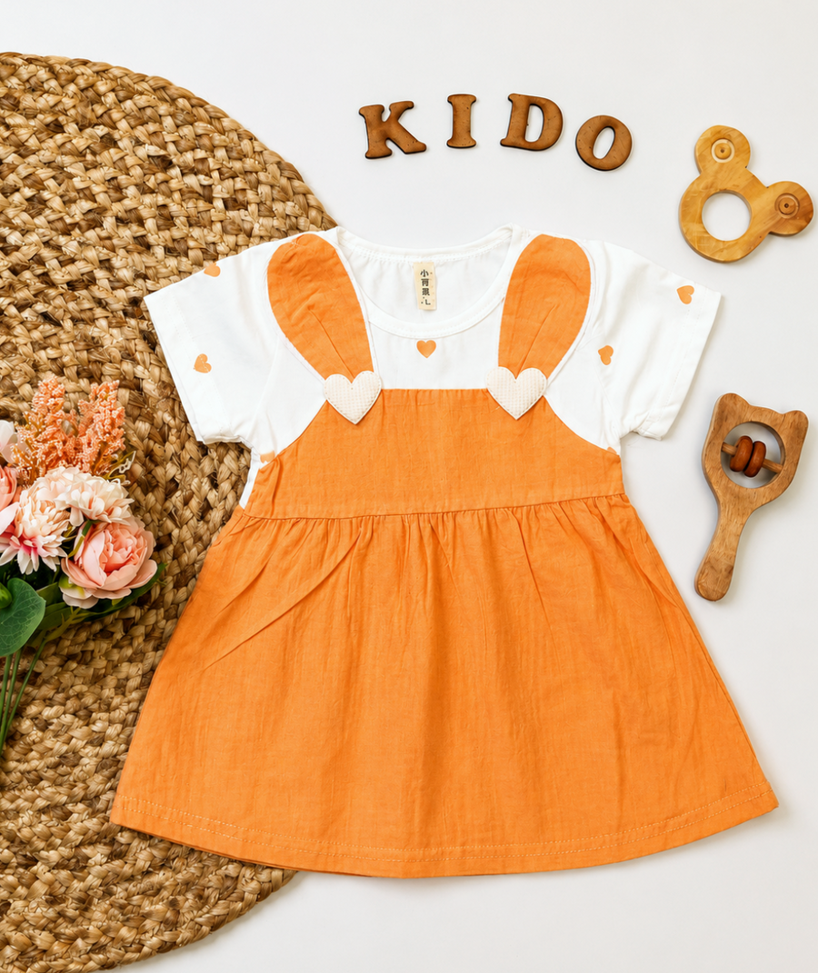 A baby girl's short-sleeve dress in orange and white